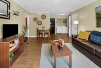 Spacious Living Room with a Washer and Dryer